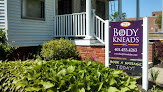 Negocio Body Kneads, Inc.